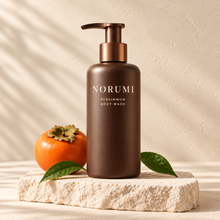 Norumi Persimmon Body Wash in a deep cocoa pump bottle